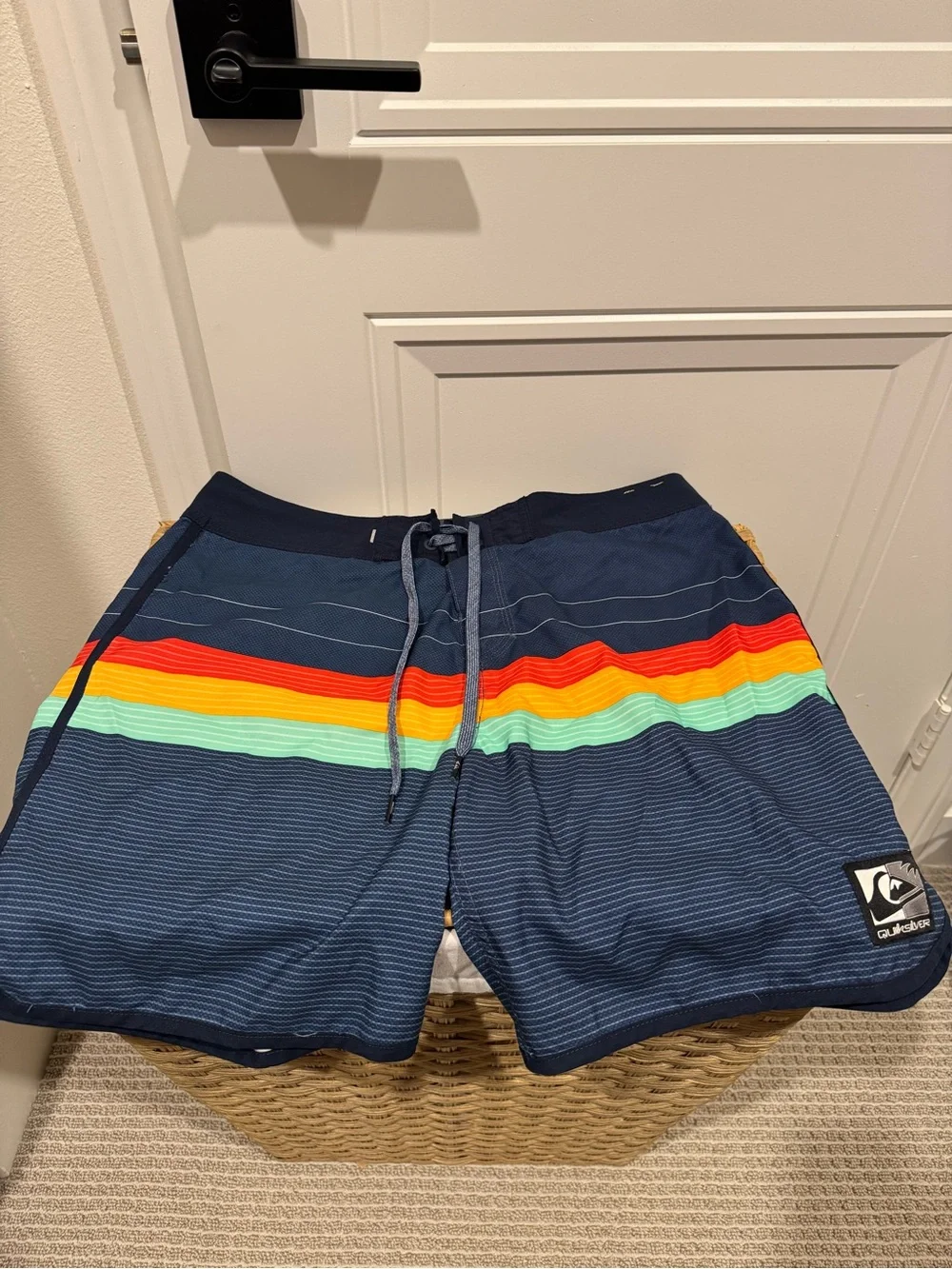 Quiksilver Men’s Navy Swim Board Shorts with Red, Orange, Yellow & Aqua Stripes